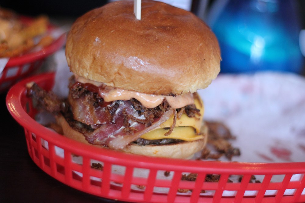 Topped with chipotle, JD candied bacon and 'slut sauce'