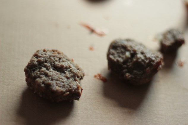 The patties, removed from the pizza...