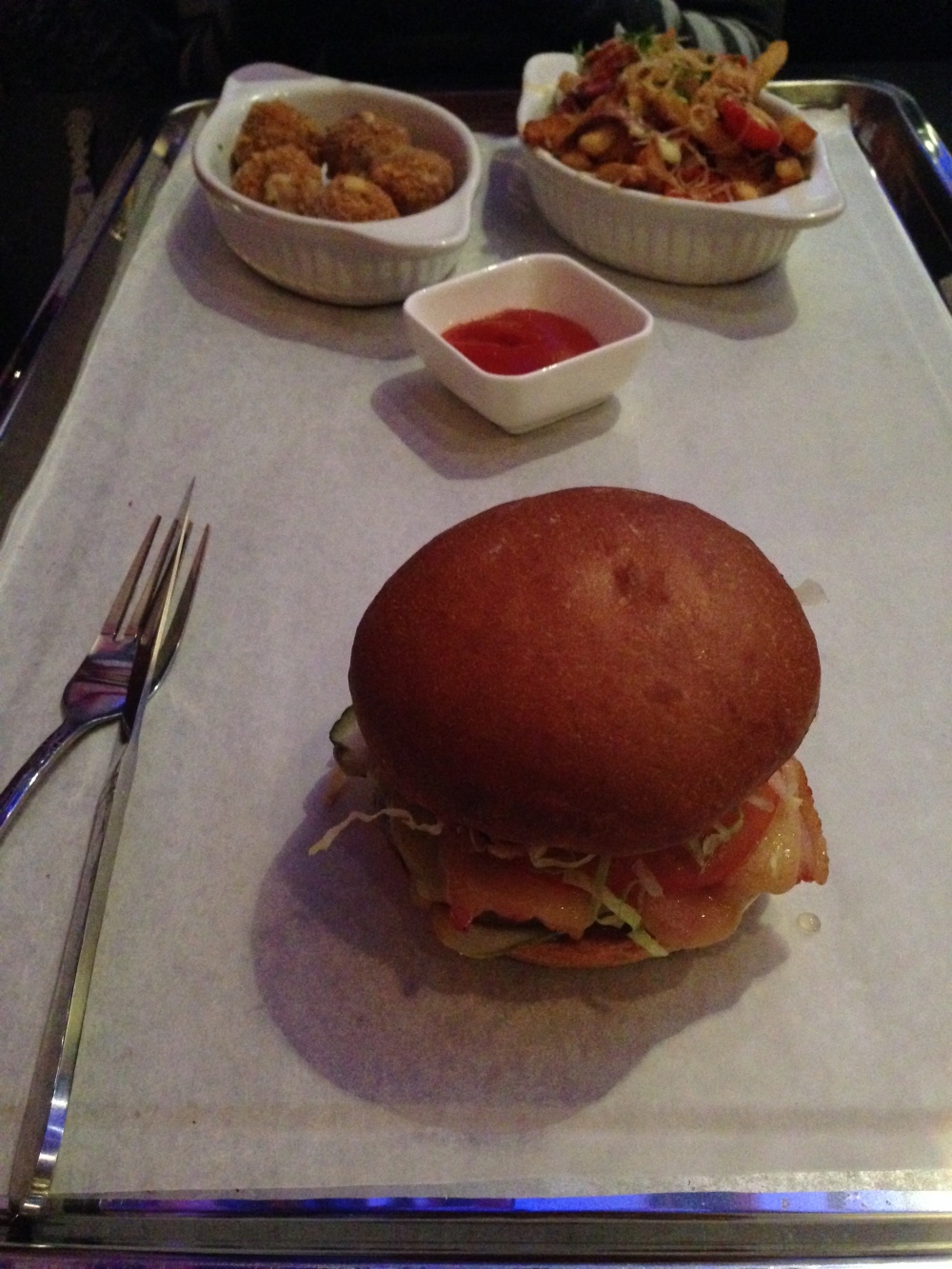 The food was presented on a large tray that filled the entire table.